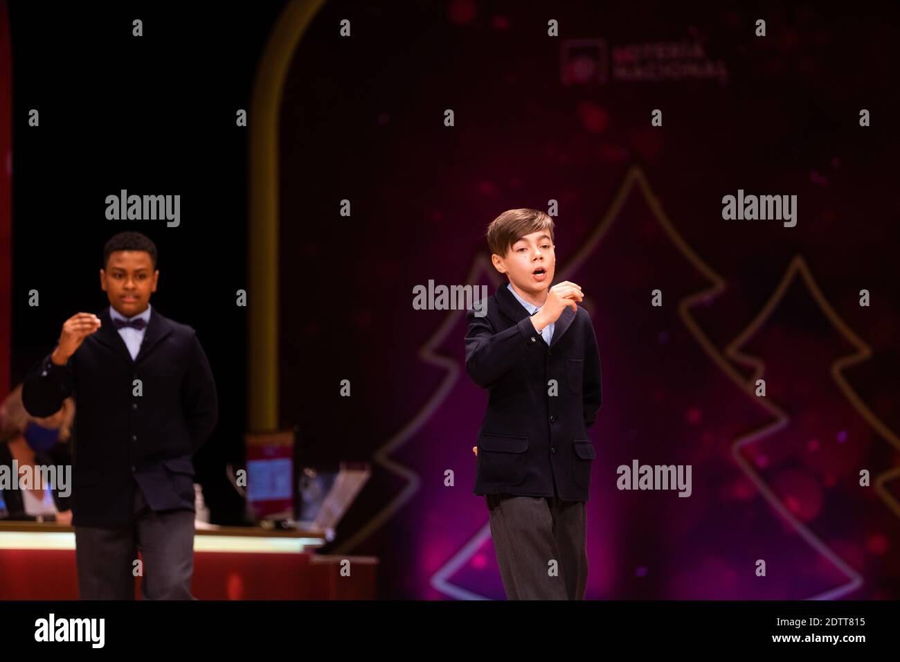 Madrid, Spain. 22 December, 2020: Pupils of the San Ildefonso school, hold the ball bearing of the fourth prize number during the draw of Spain's Christmas lottery named 'El Gordo' (Fat One) at the Teatro Real on December 22, 2020 in Madrid, Spain. The fourth prize number is 52472, with a total of 200.000 euros for the prize to be shared between ten ticket holders. Credit: Jon Imanol Reino/Alfa Images/Alamy Live News Stock Photo