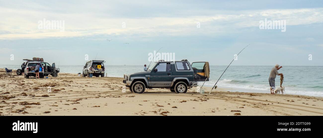 Fishers beach fishing with fishing rods at Guilderton Western Australia Stock Photo