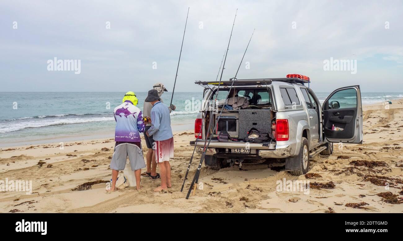 Fishers preparing their fishing rods for fishing at Guilderton Western Australia Stock Photo