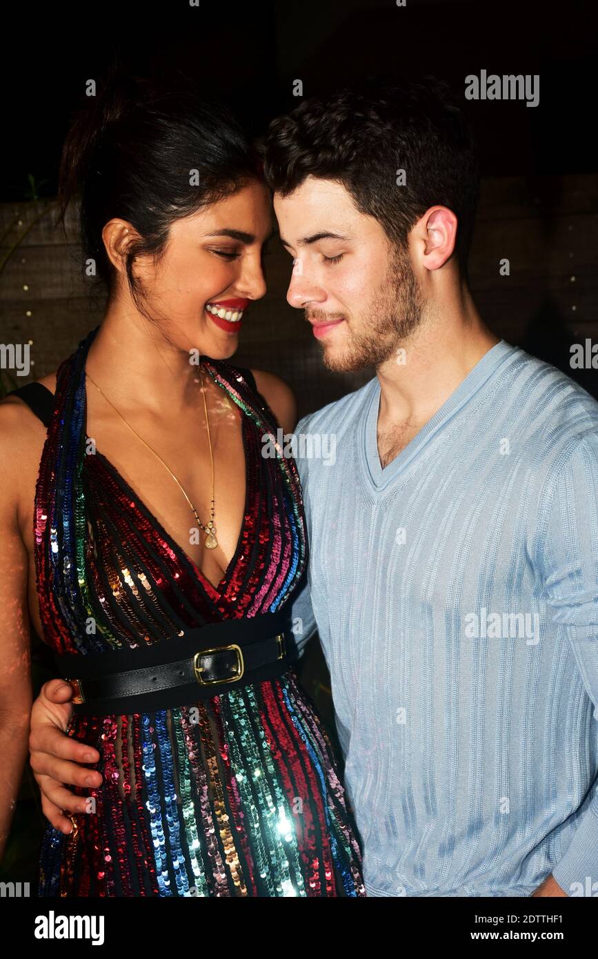 Indian actress Priyanka Chopra (Left), with her husband US musician Nick Jonas (Right), seen posing for a picture at Bumble's India launch party at So Stock Photo