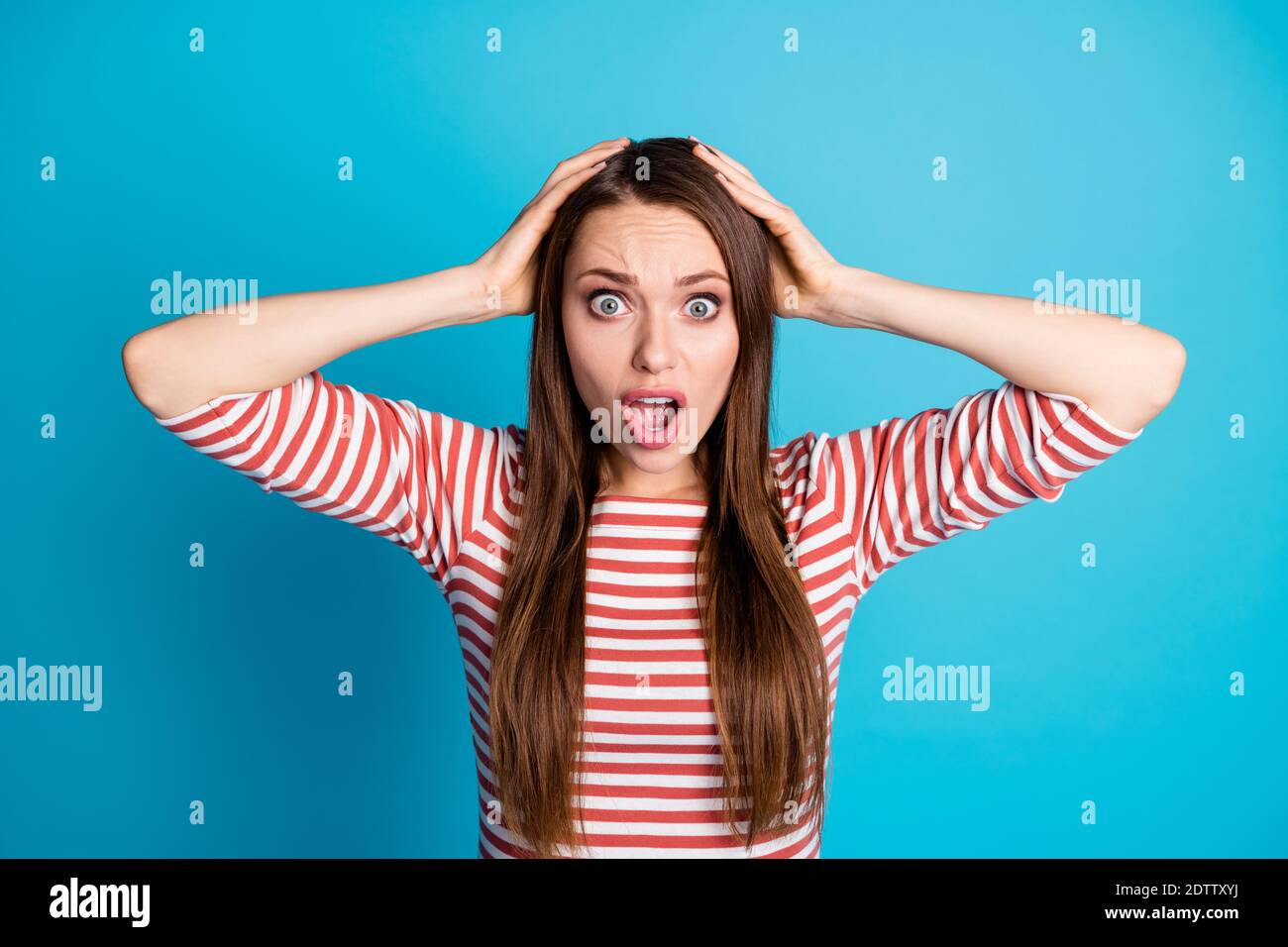 Portrait of astonished stunned crazy girl touch hands head impressed ...