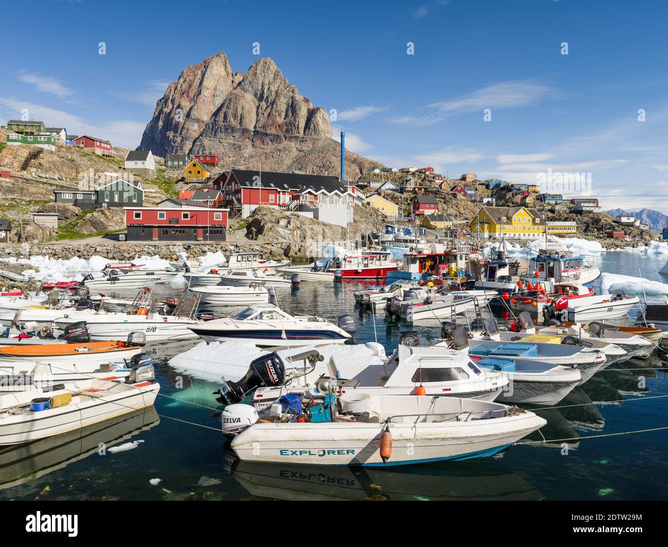 The harbour.  The town Uummannaq in the north of West Greenland, located on an island  in the Uummannaq Fjord System. America, North America, Greenlan Stock Photo
