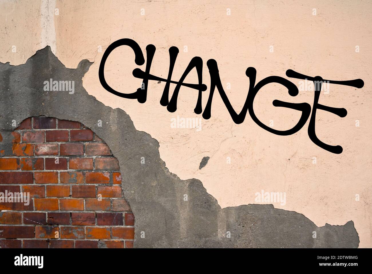 Handwritten graffiti Change sprayed on the wall, anarchist aesthetics. Appeal to fight against stability of status quo - political, personal, social, Stock Photo