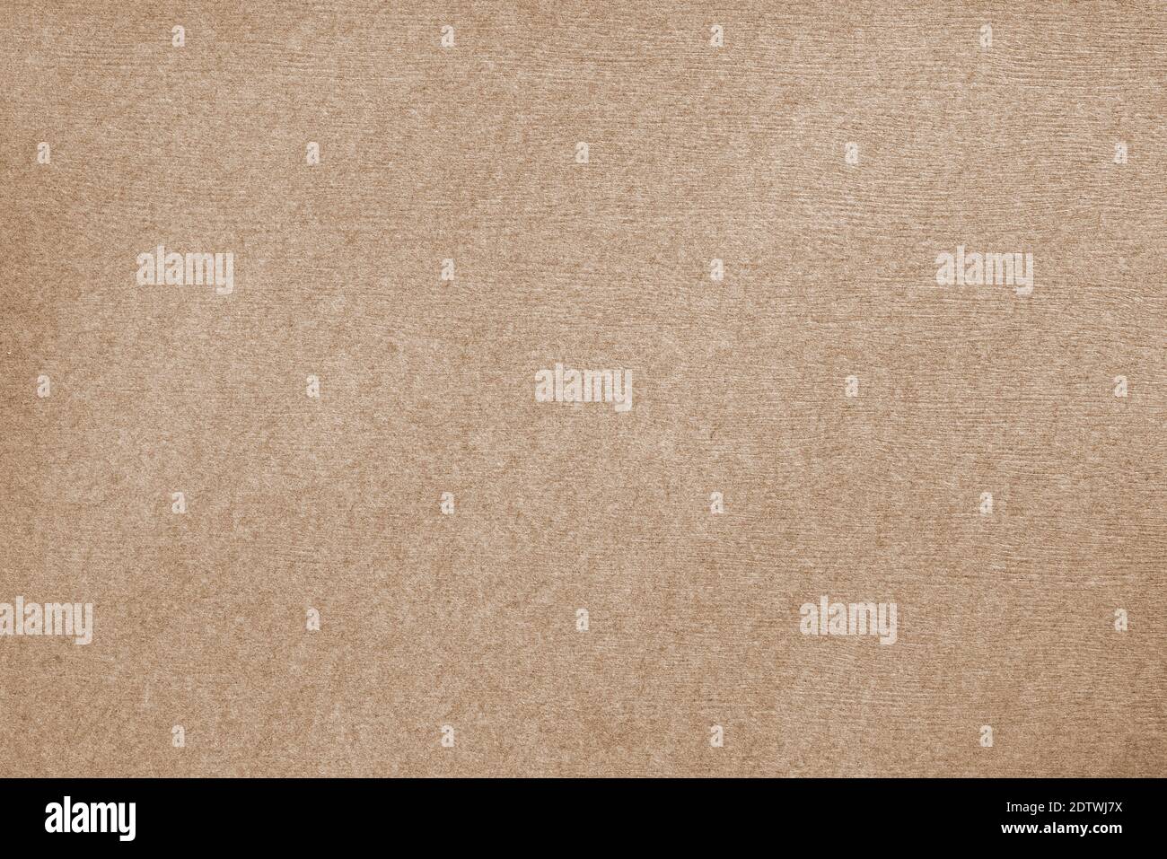 Beige textured cardboard close up. Macro texture and background Stock Photo