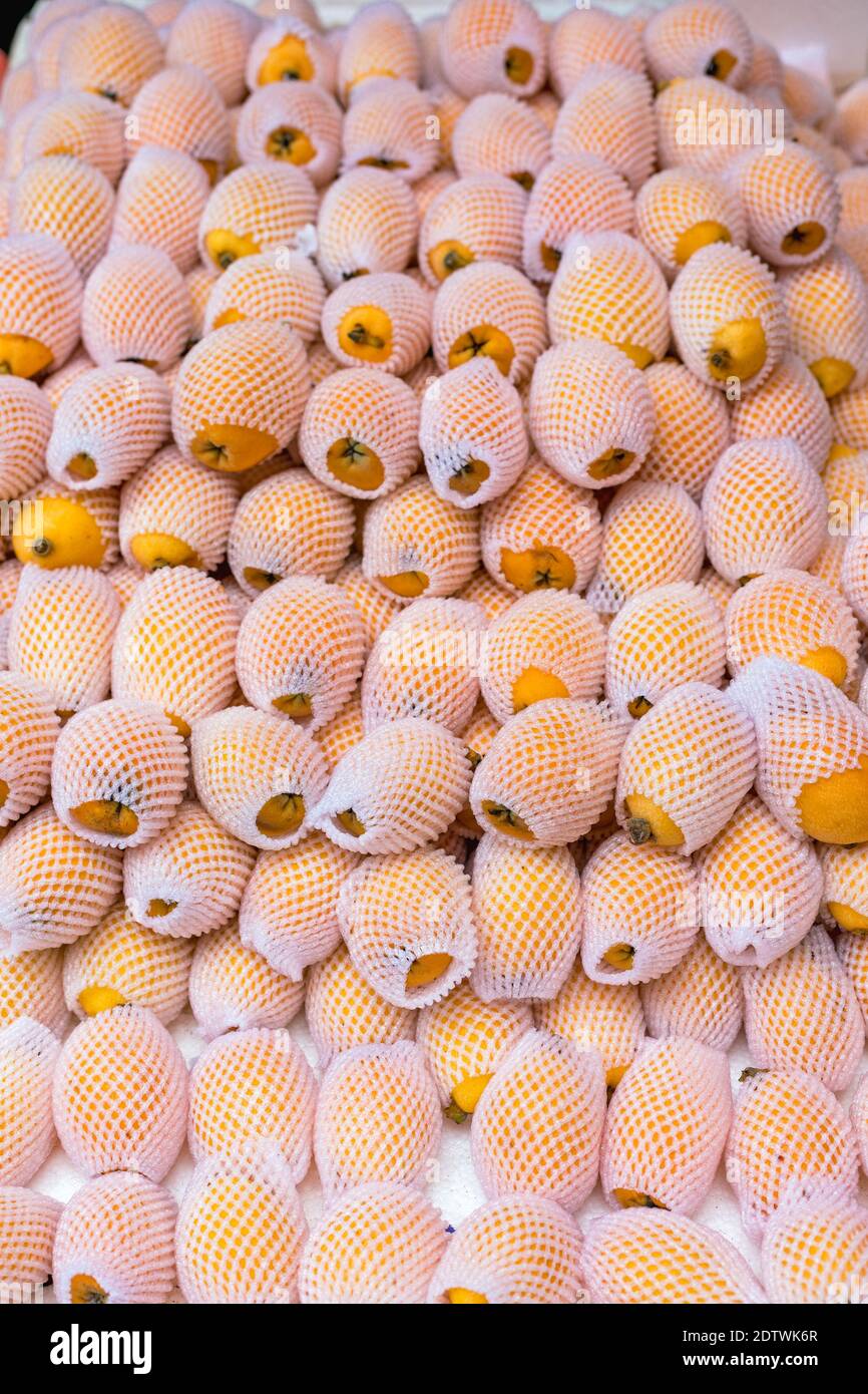 Wrapped papaya hires stock photography and images Alamy