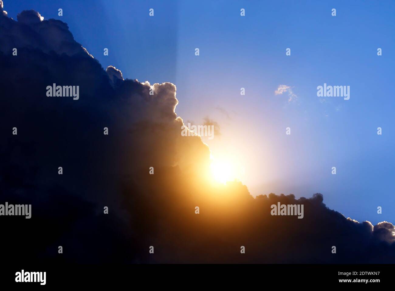 Cloudscape Background with Sun and Blue Sky Stock Photo - Alamy