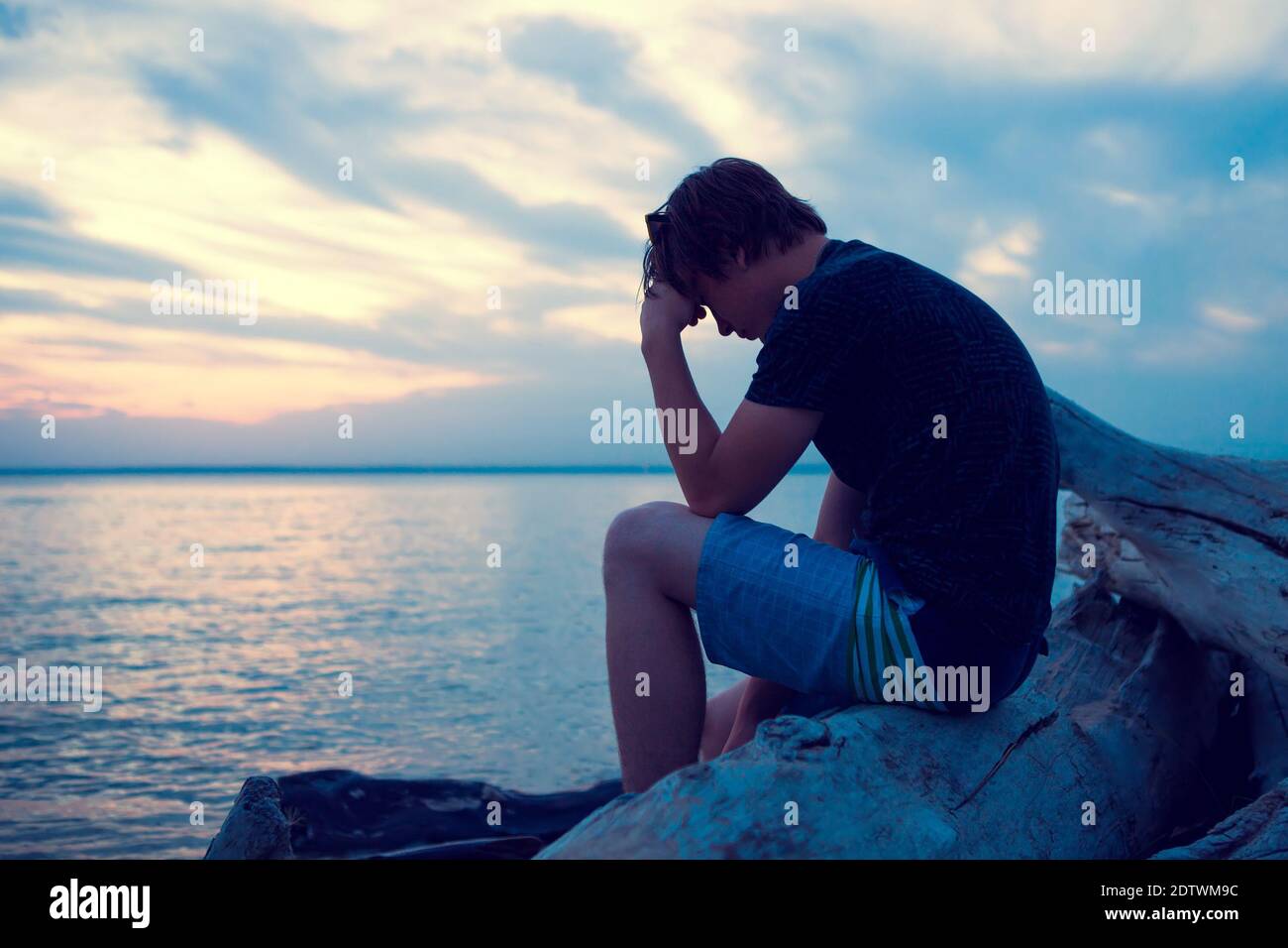 Lonely young man hi-res stock photography and images - Alamy