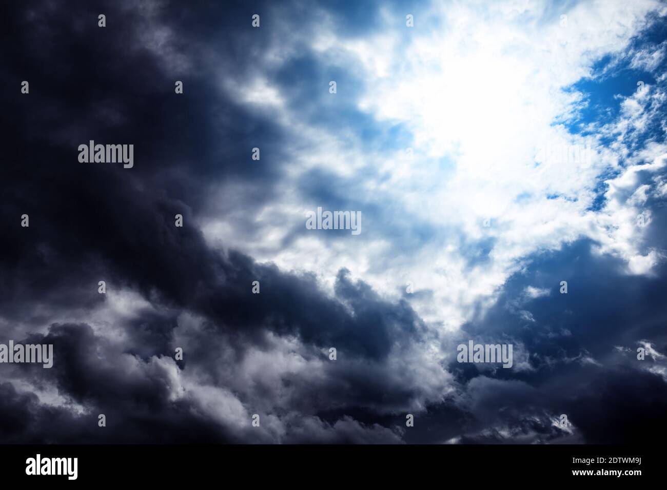 Light in the Dark and Dramatic Storm Clouds Stock Photo - Alamy