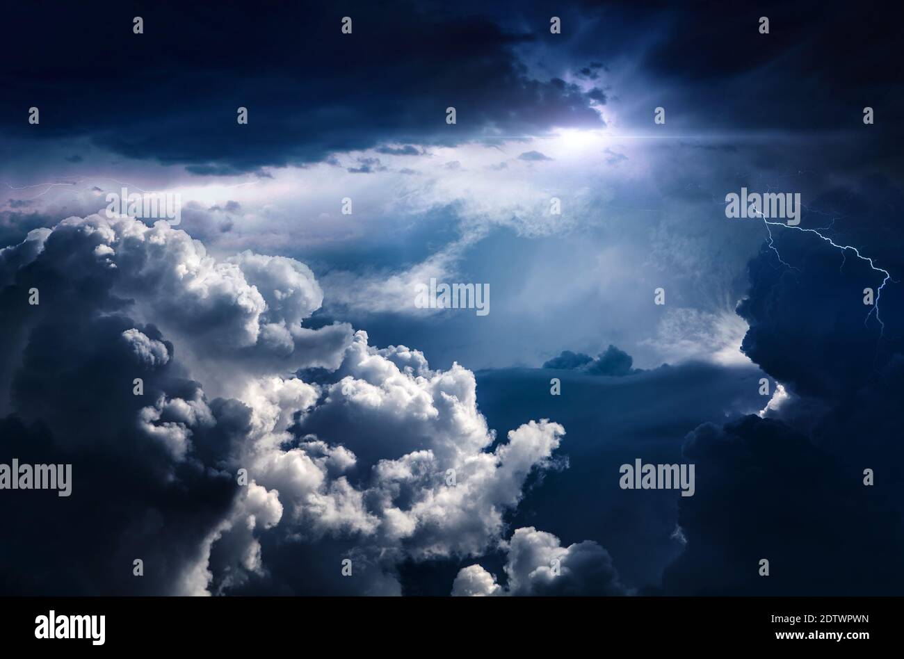 Light in the Dark and Dramatic Storm Clouds Stock Photo - Alamy