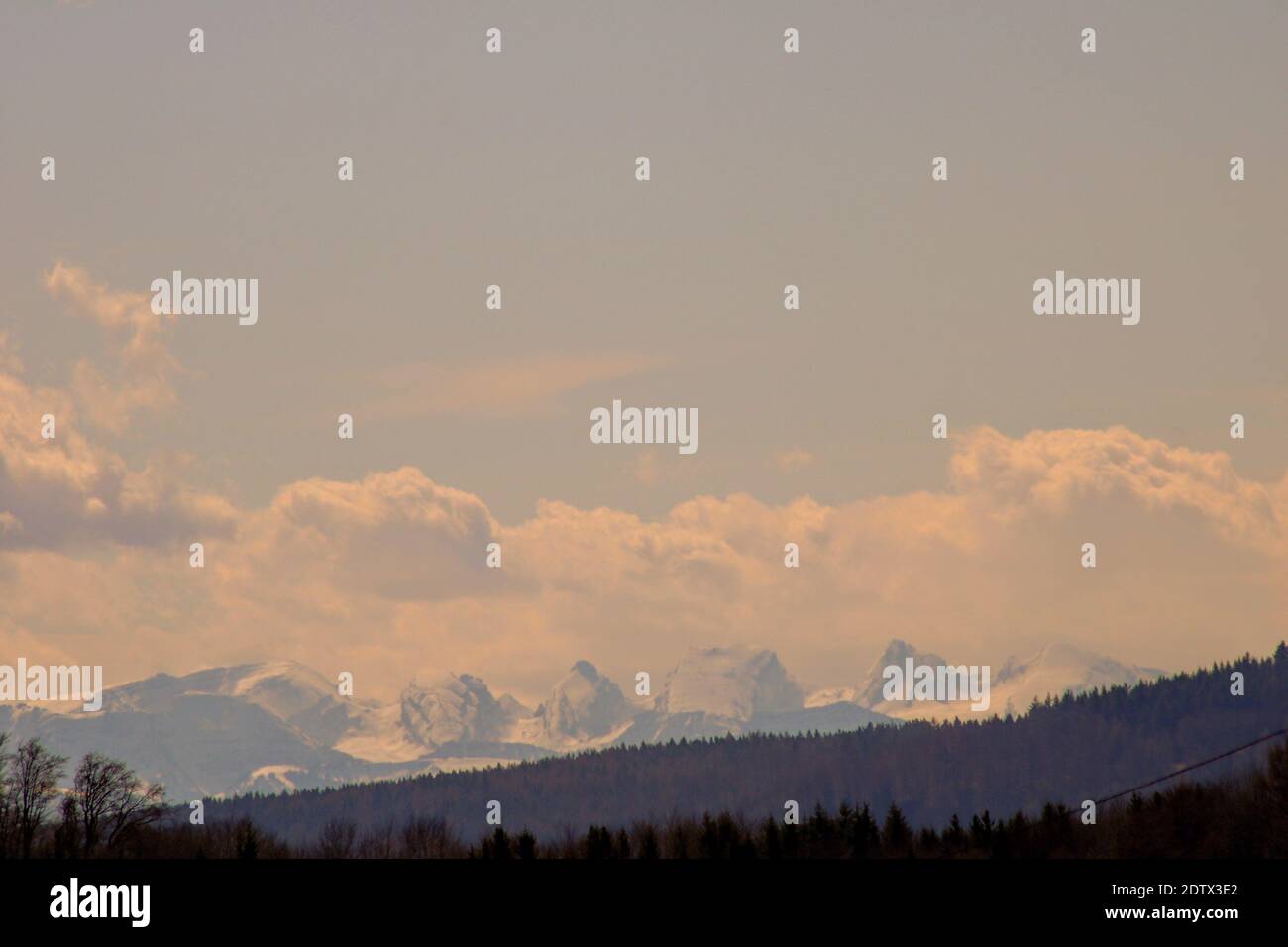 Scenic View Of Mountains Against Sky During Sunset Stock Photo