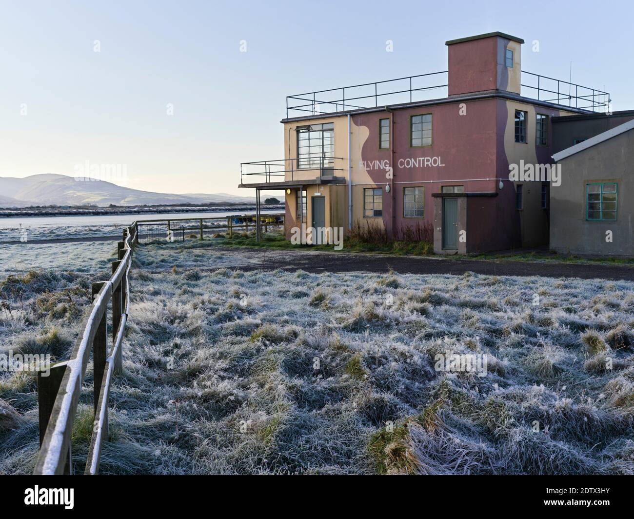 The control tower at old WWII Jurby airfield on a frosty morning, Isle of Man Stock Photo