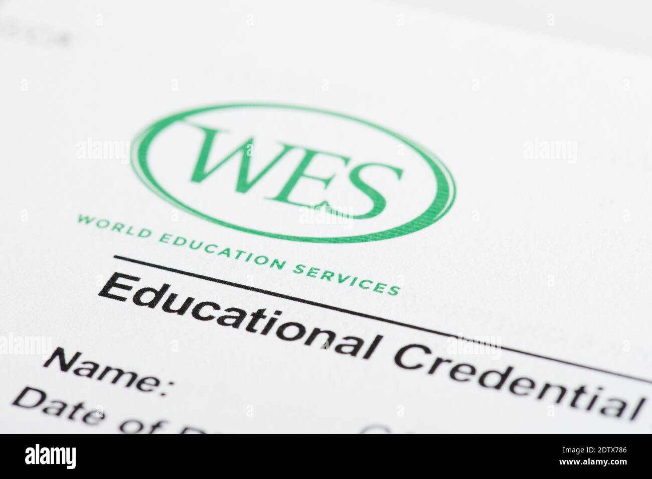 New york, USA - December 22, 2020: Wes educational  credential report on paper macro close up view Stock Photo