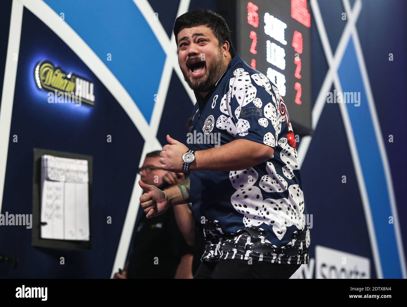 Danny Baggish celebrates after beating Adrian Lewis during day eight of the  William Hill World Darts Championship at Alexandra Palace, London Stock  Photo - Alamy
