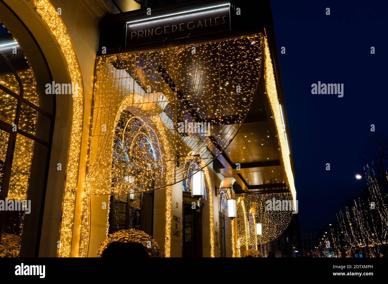 Prince de Galles Hotel with Christmas lights on avenue George V - Paris, France Stock Photo