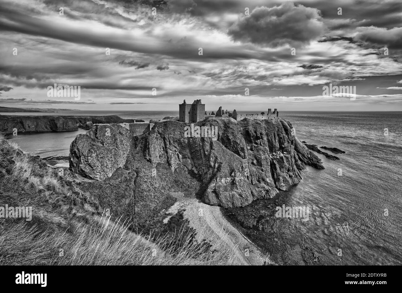 Medieval fortress Dunnottar Castle (Aberdeenshire, Scotland) - monochromatic image Stock Photo