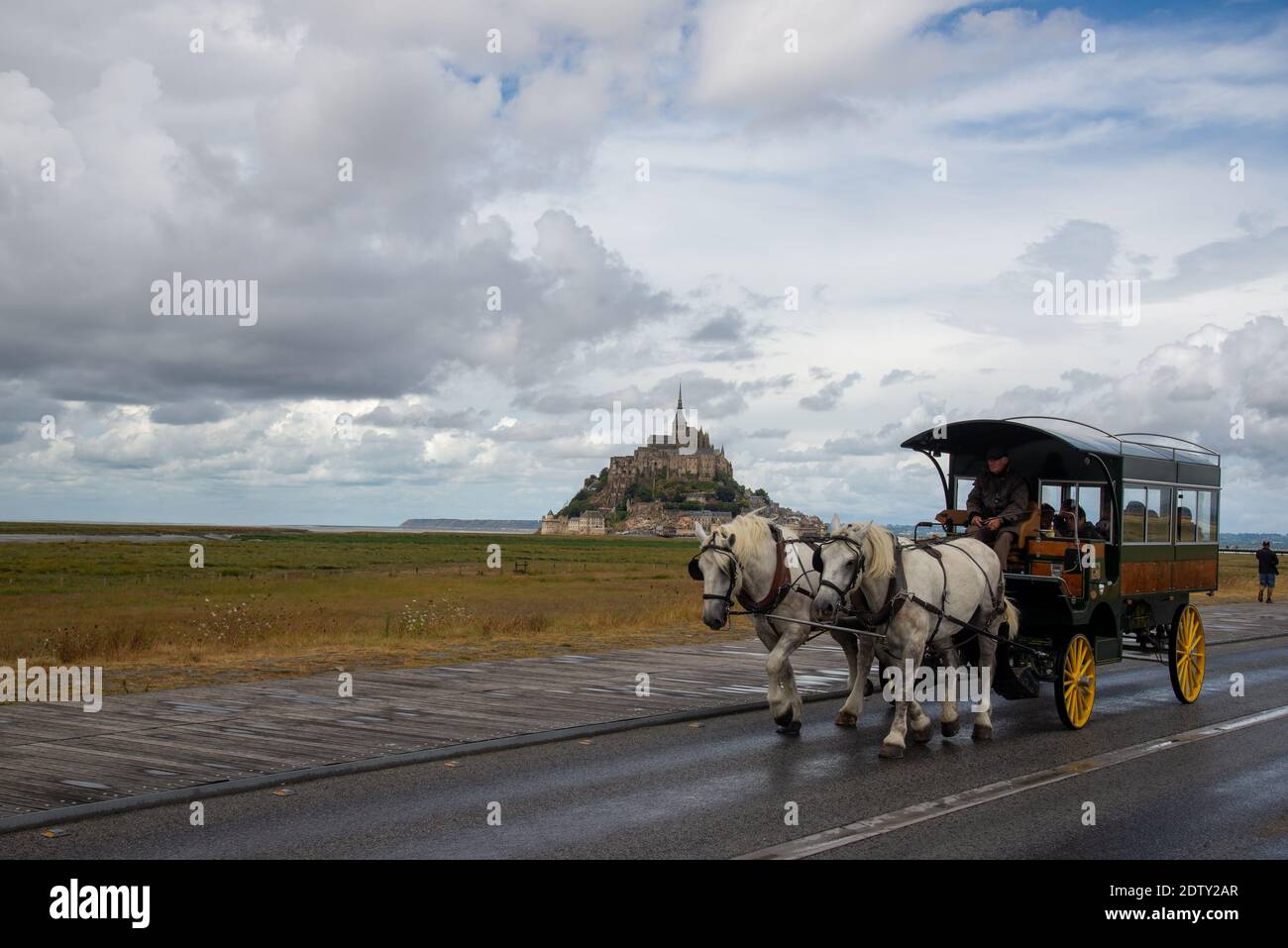 horse cart with visitors at Mont St. Michel in Bretagne, France Stock Photo