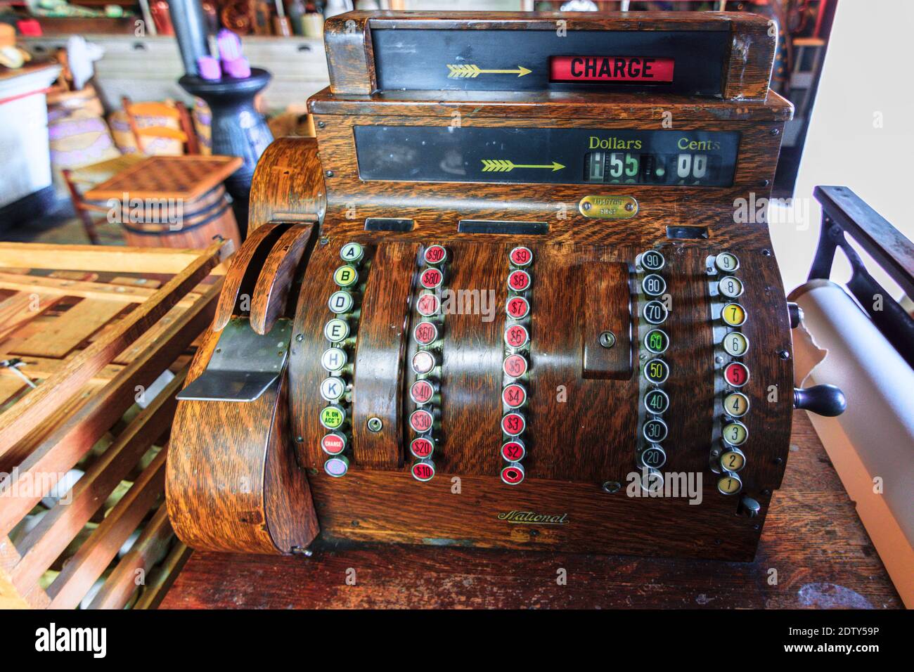 Old vintage cash register with colourful buttons Stock Photo