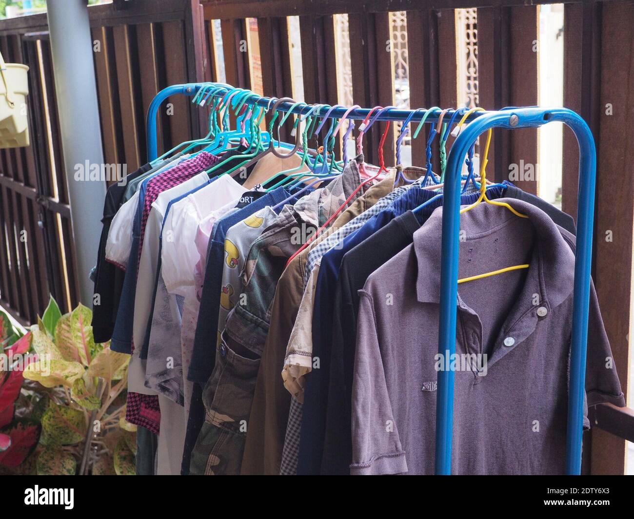 High Angle View Of Clothes Hanging On Rack By Fence Stock Photo - Alamy