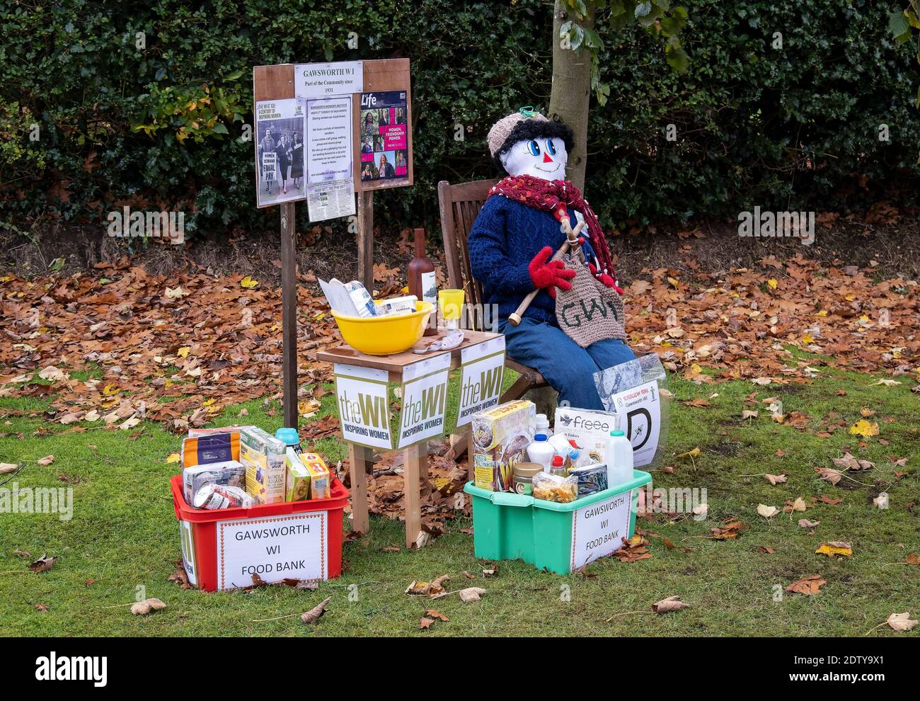 WI Women's Institute Scarecrow Foodbank, Gawsworth, Cheshire, England, UK Stock Photo