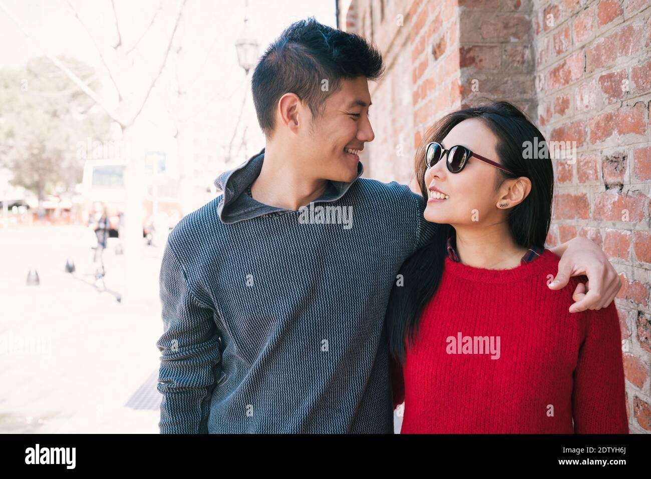 Asian couple walk hi-res stock photography and images - Alamy