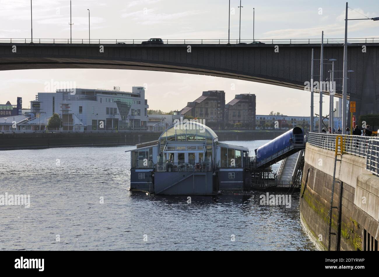 The old Renfrew ferry at Anderston Quay, Glasgow, Scotland is now a food and entertainment venue on the river Clyde below the Kingston bridge. Stock Photo