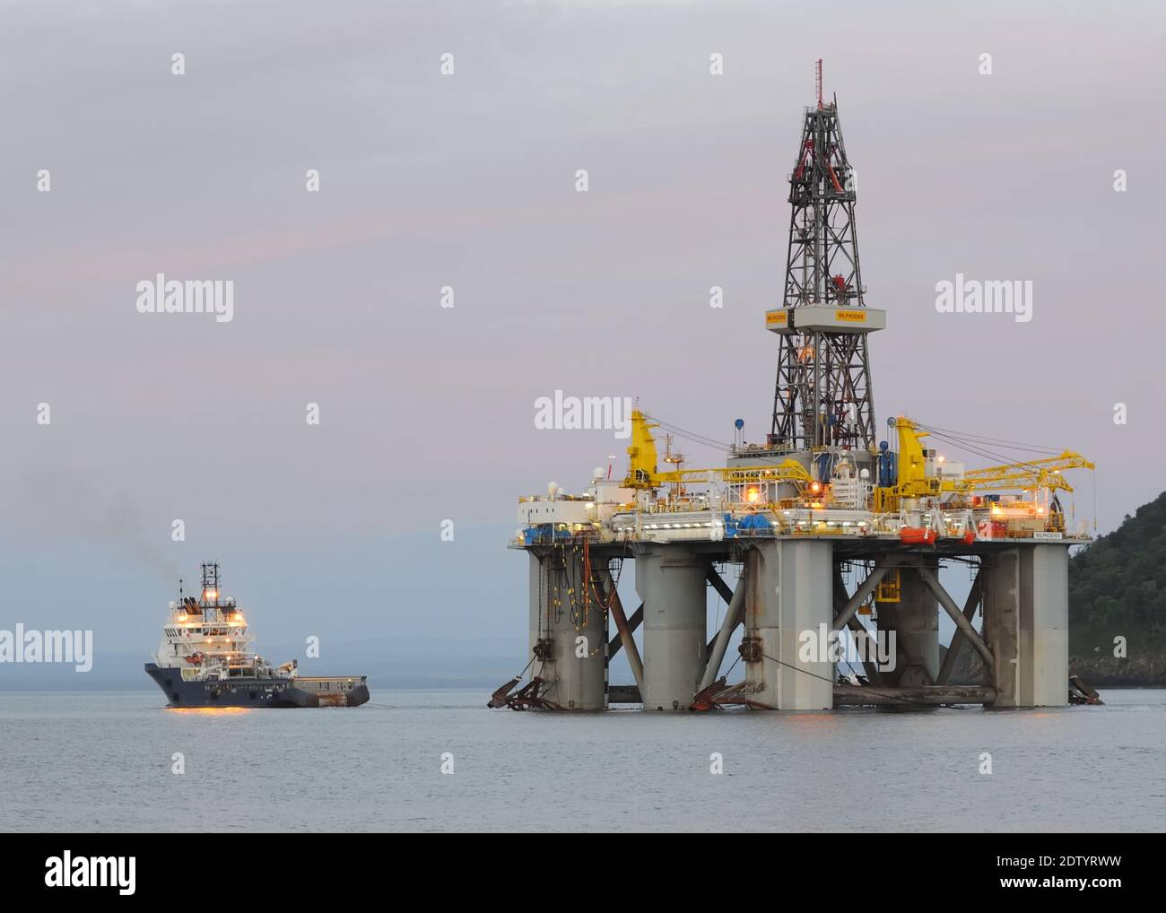 The WilPhoenix is a 3rd-Generation, Enhanced Pacesetter, Harsh-Environment, Mid-Water, Semi-Submersible Drilling Rig being towed from Cromarty Firth Stock Photo