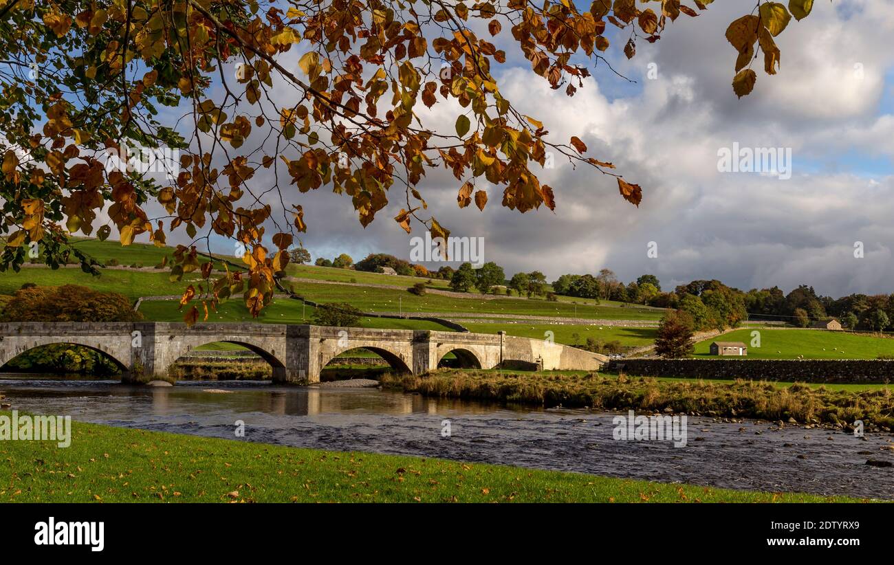 Burnsall is a small English village along the River Wharfe in the county of North Yorkshire and in the 'Yorkshire Dales National Park'. Stock Photo
