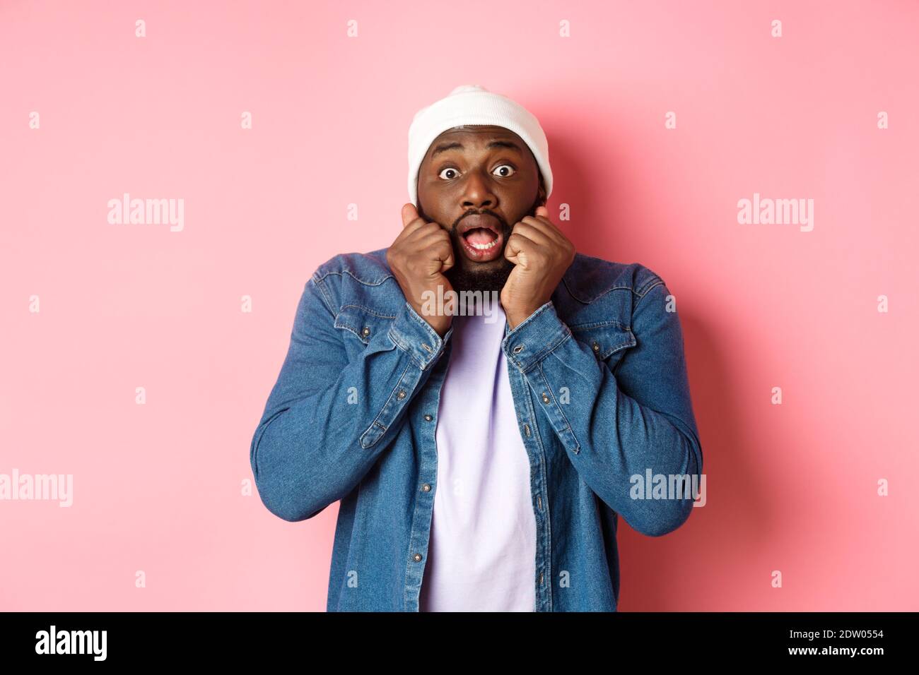 Man scared hands face hi-res stock photography and images - Alamy