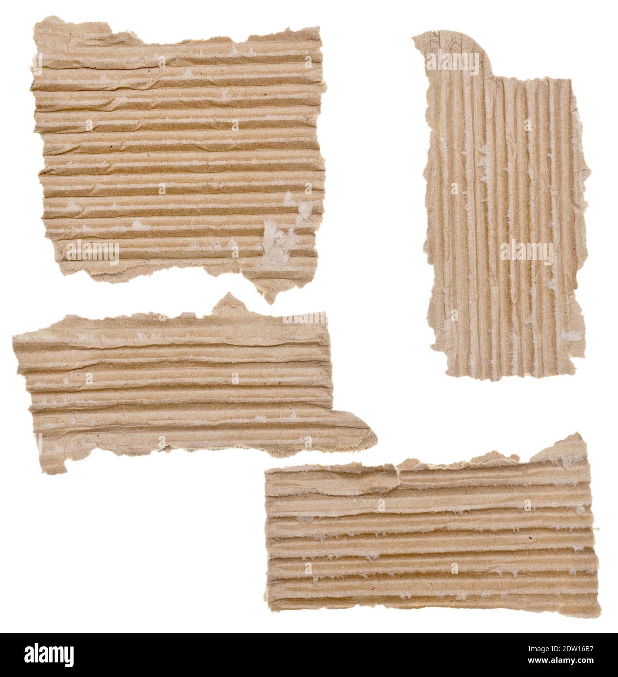 Pieces of cardboard and paper on white background Stock Photo - Alamy