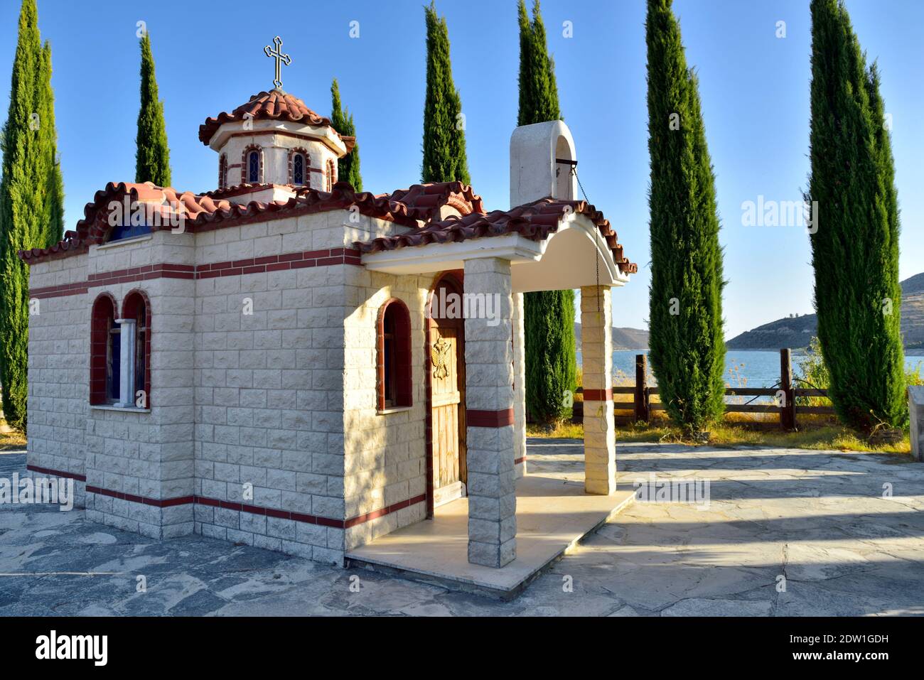New tiny Saint Nicolas Church built as replacement for one flooded when Kouris Reservoir filled and flooded village of Alassa in the 1980's, Cyprus Stock Photo