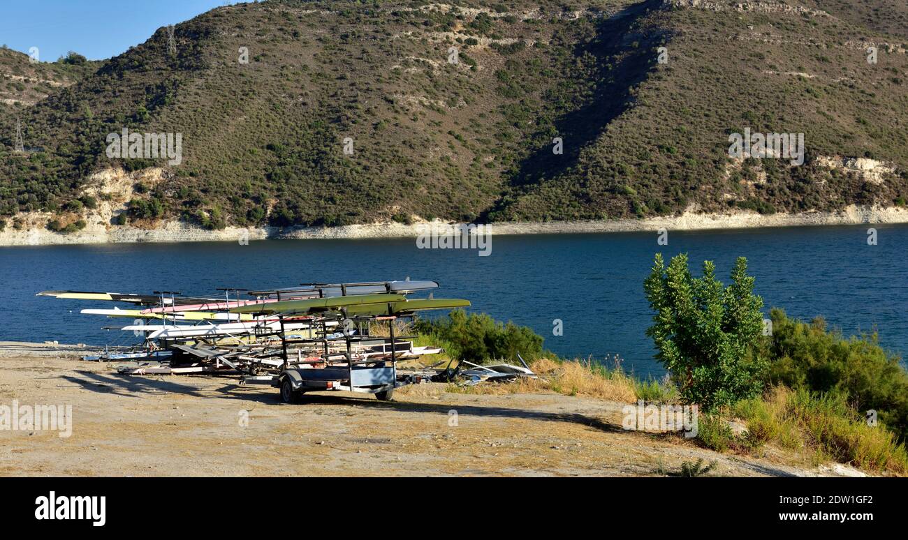 Rowing skulls on trailers by side of Kouris Reservoir near Limassol, largest reservoir in Cyprus Stock Photo
