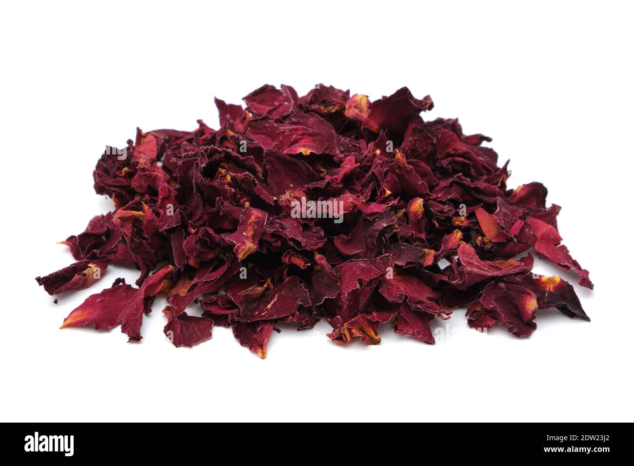 Pile of dried healthy rose petals. Dry red rose petals heap on white