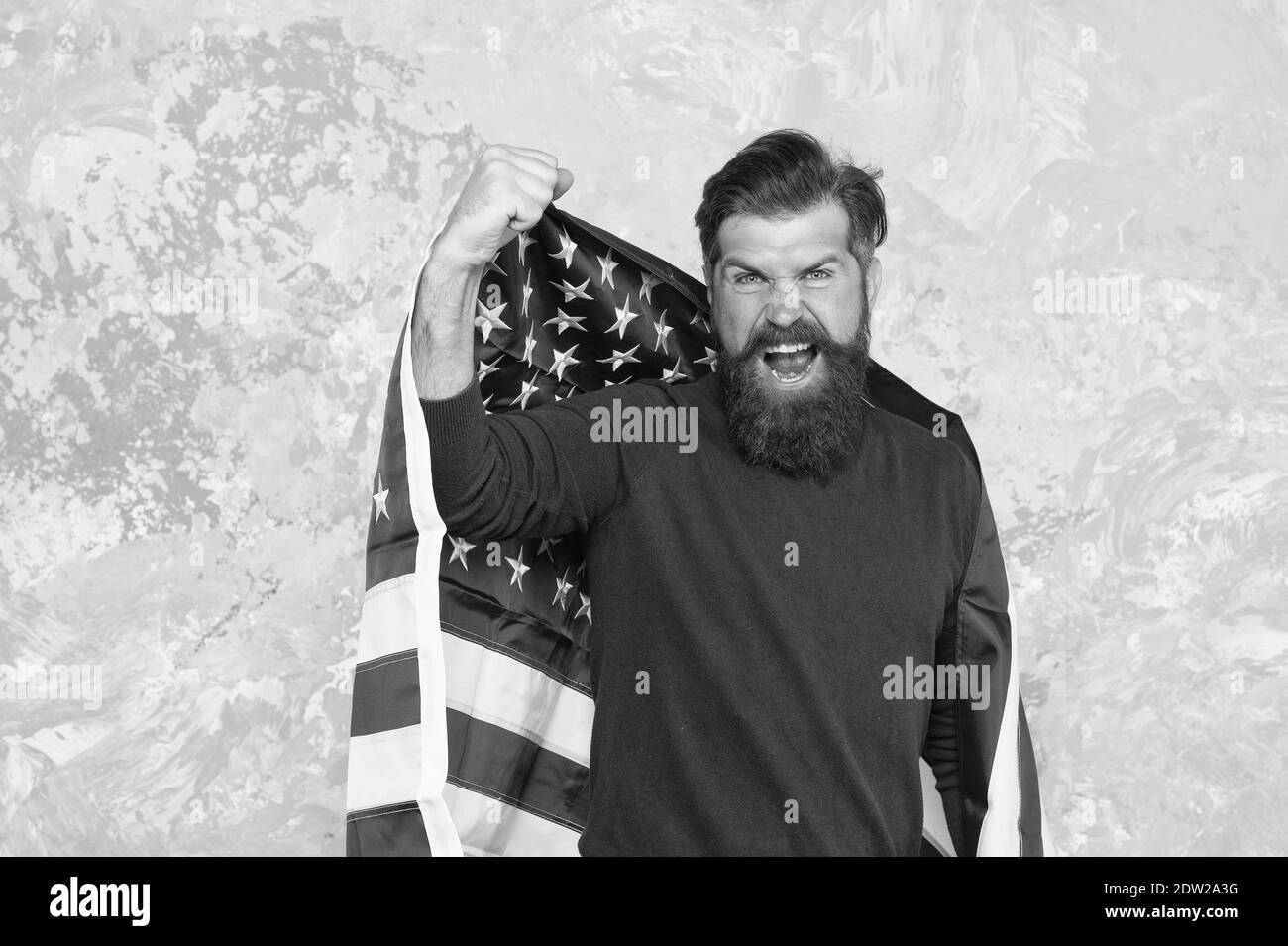 express pure emotions. happy celebration of victory. bearded hipster man being patriotic for usa. american education reform in july 4. american citizen at usa flag. american citizen in the election. Stock Photo