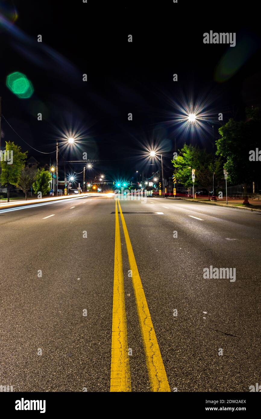 Light Trails On Road At Night Stock Photo