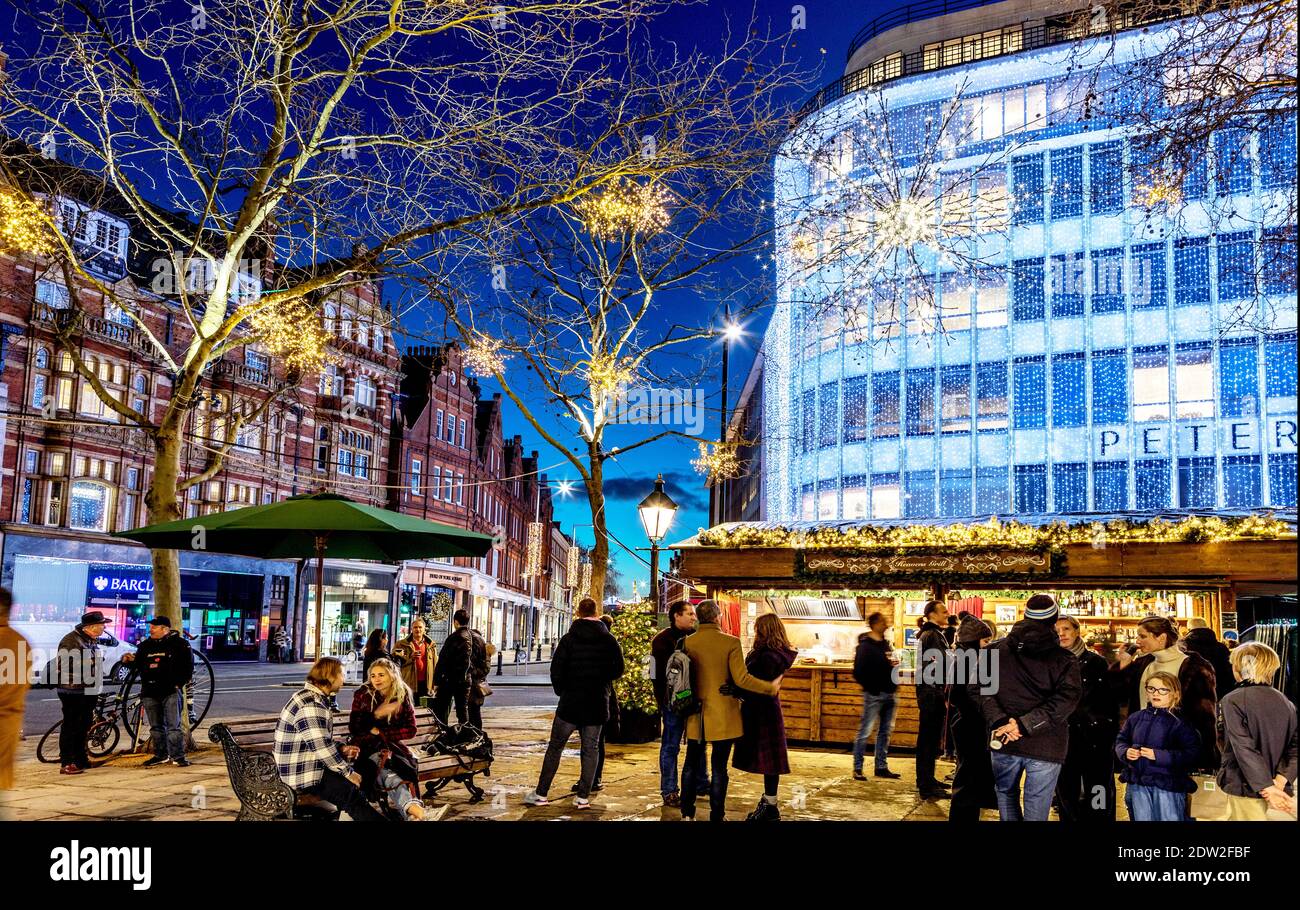 People Celebrating Christmas in Sloane Square at Night London UK Stock Photo Alamy