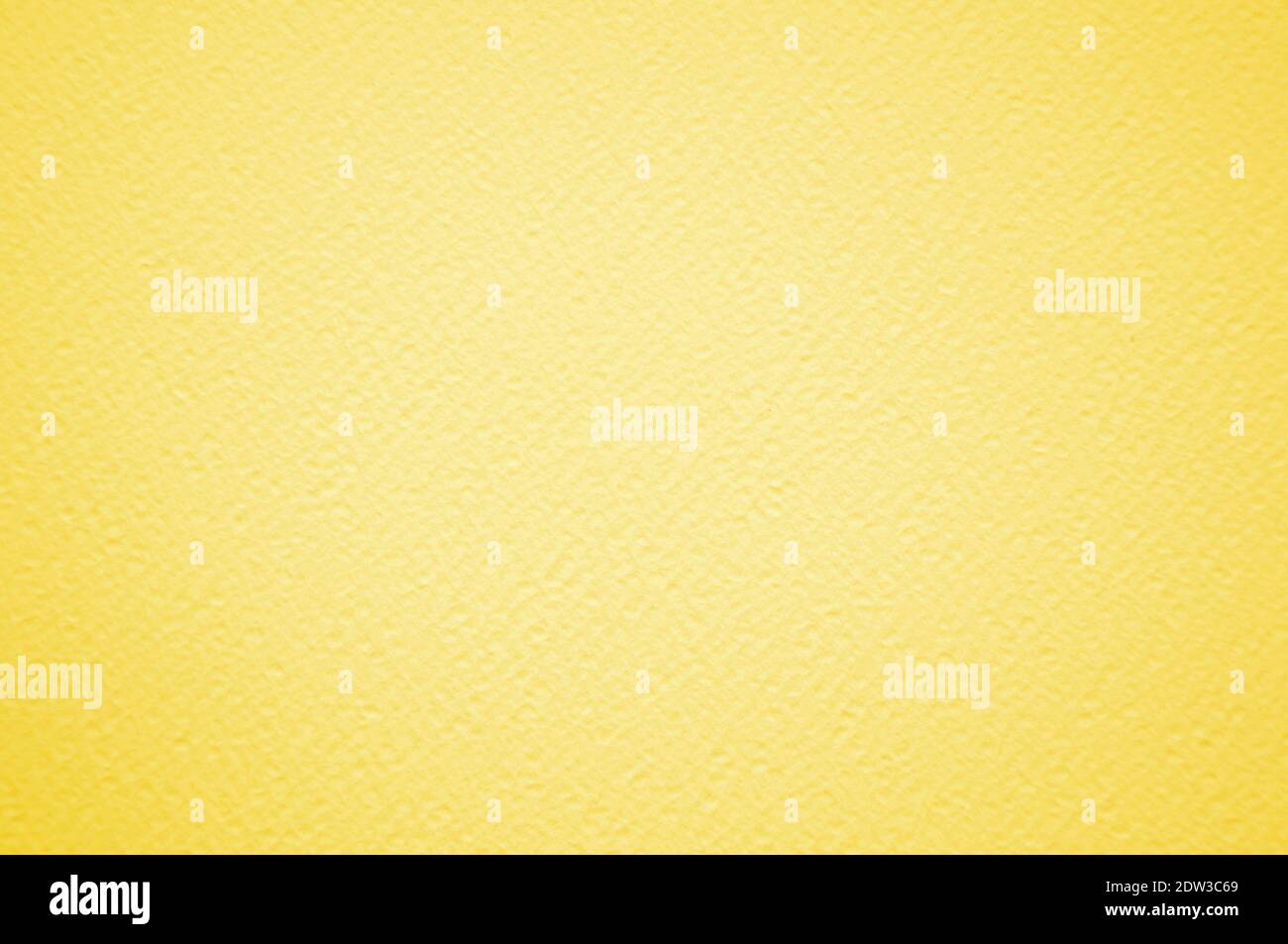 Yellow watercolor  paper texture or background. Illuminating yellow. Trendy color 2021 Stock Photo