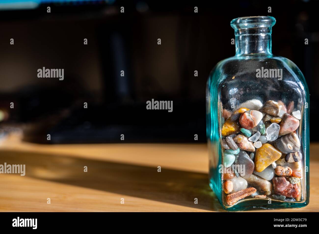 collection of memories half filling a glass jar Stock Photo Alamy