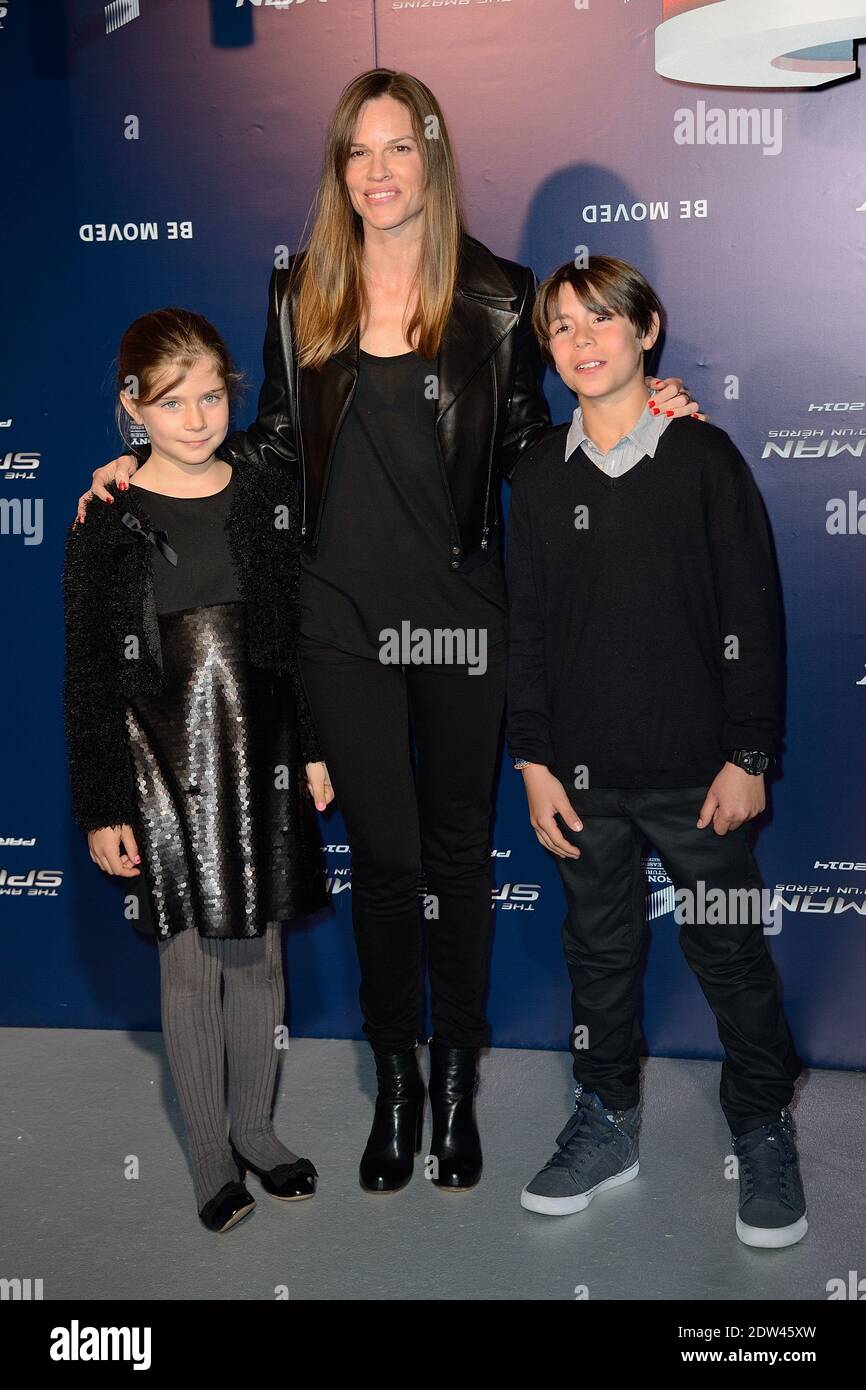 Hilary Swank poses with children Margaux and Timoty during the premiere