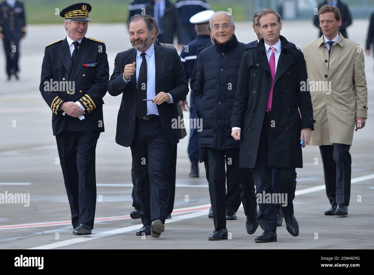 The CEO of Europe 1, Denis Olivennes, Jean Pierre Elkabbach and Fabien Namias arrive to welcome four French journalists, Edouard Elias, Didier Francois, Nicolas Henin and Pierre Torres, taken hostage in Syria last year and freed yesterday, at the Villacoublay air base southwest of Paris on April 20, 2014. They had been captured in two separate incidents in June last year while covering the conflict in Syria. Photo by Nicolas Gouhier/ABACAPRESS.COM Stock Photo
