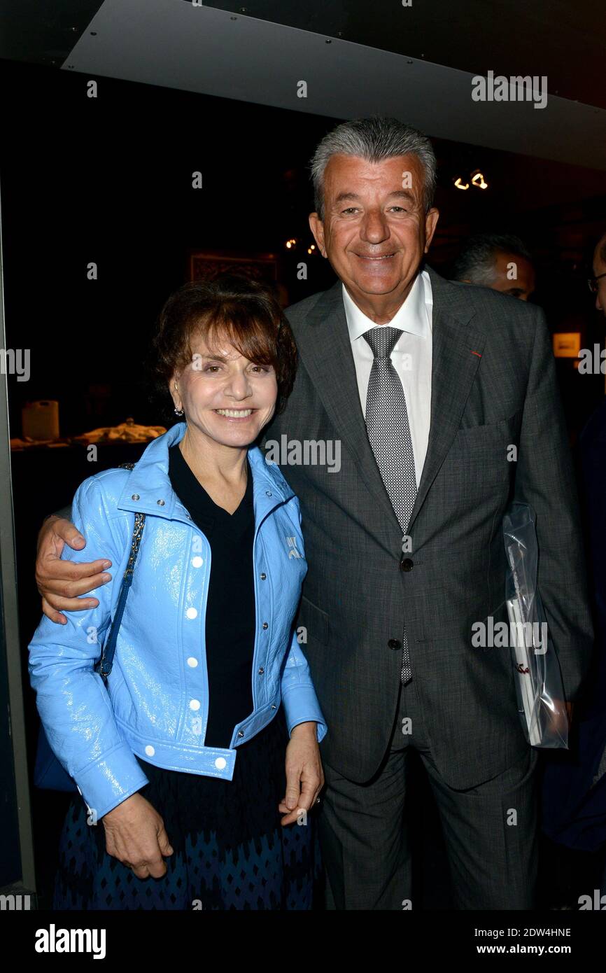 Tarak Ben Ammar (right) and Monique Lang attend inauguration of an exhibition about the 'hajj' or 'pilgrimage' at the Institut du Monde Arabe in Paris, France, on April 22, 2014. It will stay until the end of August 2014. Photo by Ammar Abd Rabbo/ABACAPRESS.COM Stock Photo