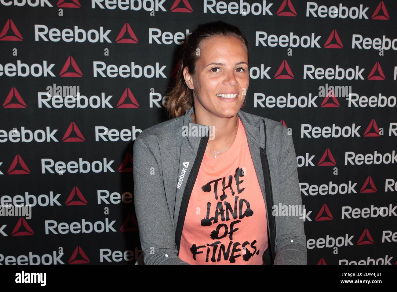 Reebok Team ambassador Laure Manaudou attends a signing session to launch  the campaign 'Live with Fire' held at Intersport Rivoli store in Paris,  France on April 23, 2014. Photo by Audrey Poree/ABACAPRESS.COM