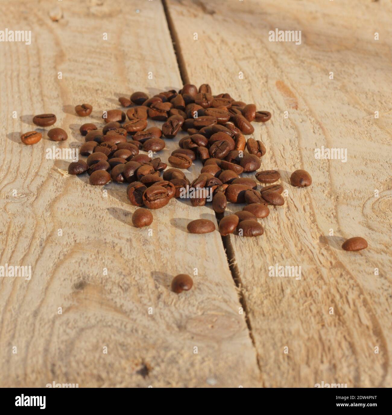 roasted coffee beans on wood Stock Photo