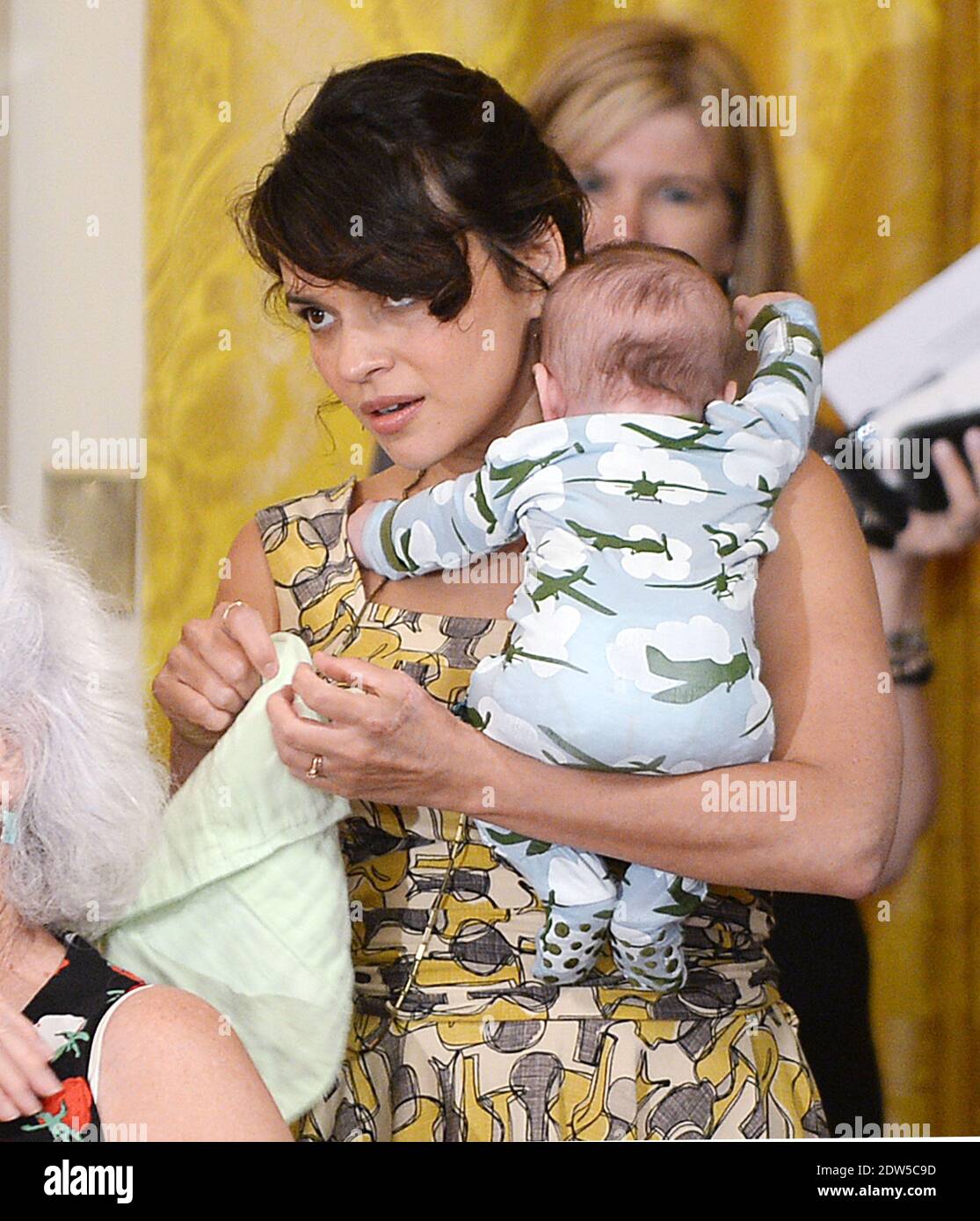 Singer Norah Jones with her 3 month old baby attends a event to honor  military mothers in the East Room of the White House in Washington, DC,  USA, on May 12, 2014.