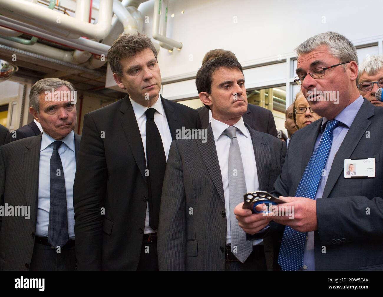 Arnaud Montebourg and Prime mnnister Manuel Valls visits Straubli plant in Faverges, France wifh the Chairman françois morisse and former nationl assembly president Bernard Accoyer on May 12, 2014. Photos by Vincent Dargent/ABACAPRESS.COM Stock Photo