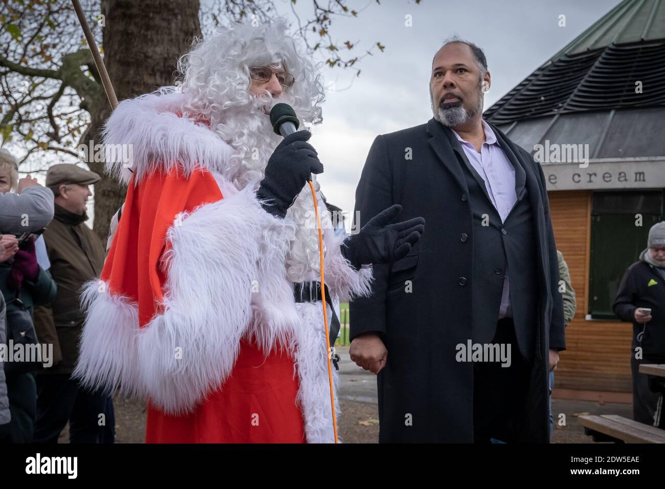 Coronavirus: Anti-lockdown ‘Santa Saves Christmas’ protest at Speakers’ Corner, Hyde Park, London, UK. Stock Photo
