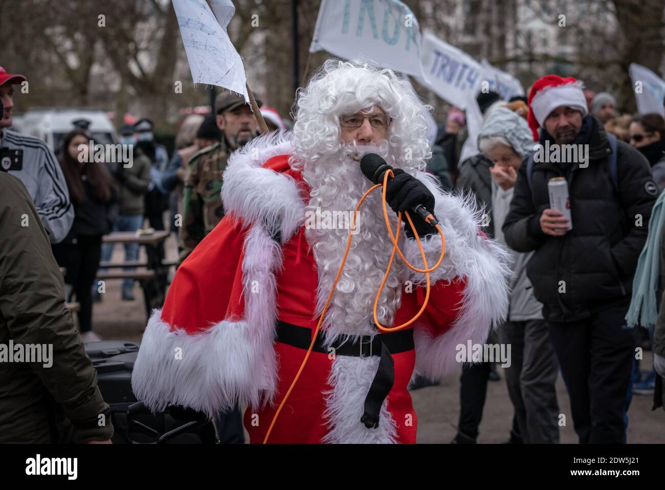 Coronavirus: Anti-lockdown ‘Santa Saves Christmas’ protest at Speakers’ Corner, Hyde Park, London, UK. Stock Photo