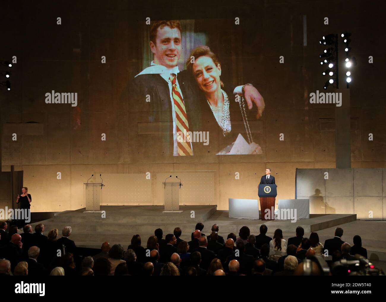 May 15th, 2014, New York, NY- (EDN: Caption corrected) US President Barak Obama spoke about Wells Crowther, pictured on the screen with his mother Alison during the dedication ceremony at the National September 11 Memorial Museum in New York.Credit: Chang W. Lee/The New York Times/Pool Assignment ID: 30158360A Stock Photo