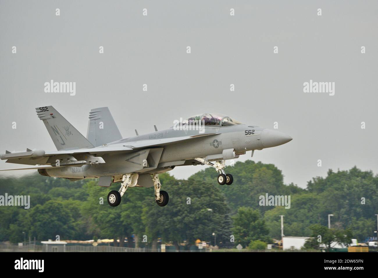 Flight demonstration featuring lethal capabilities of F-18 Super Hornet jet fighter at EAA AirVenture, Oshkosh, Wisconsin, USA Stock Photo