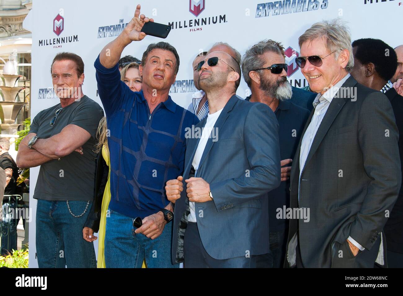 The cast including Director Patrick Hughes, Sylvester Stallone, Jason Statham, Harrison Ford, Wesley Snipes, Dolph Lundgren, Glen Powell, Randy Couture, Antonio Banderas, Arnold Schwarzenegger, Kellan Lutz and Natalie Burn arriving at the photocall of the film Expendables 3 as part of the 67th Cannes International Film Festival in Cannes, southern France on May 18, 2014. Photo by Nicolas Genin/ABACAPRESS.COM Stock Photo