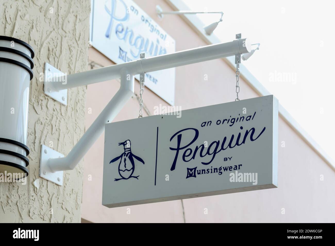 Orlando, Florida, USA - February 24, 2020:  Close up of Original Penguin by Munsingwear store hanging sign is shown. Stock Photo